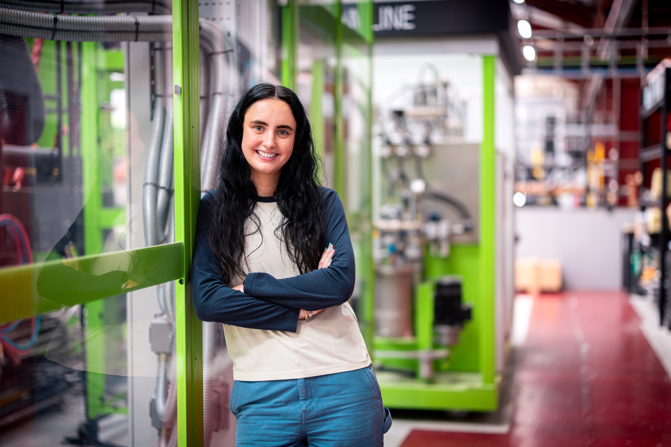 Young woman at work in defence job